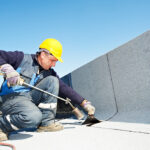 Flat roof covering works with roofing felt Altrincham